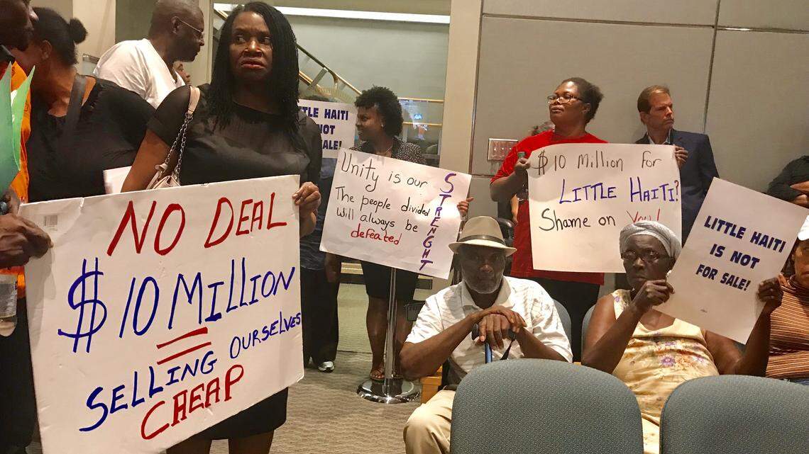 Little Haiti activist Marleine Bastien, left, led a group of residents opposed to a proposed 22-acre redevelopment called Eastside Ridge during a 2018 hearing at Miami City Hall. The massive complex of residential and commercial towers would replace the D Place apartments on the corner of Northeast Second Avenue and Northeast 50th Street.