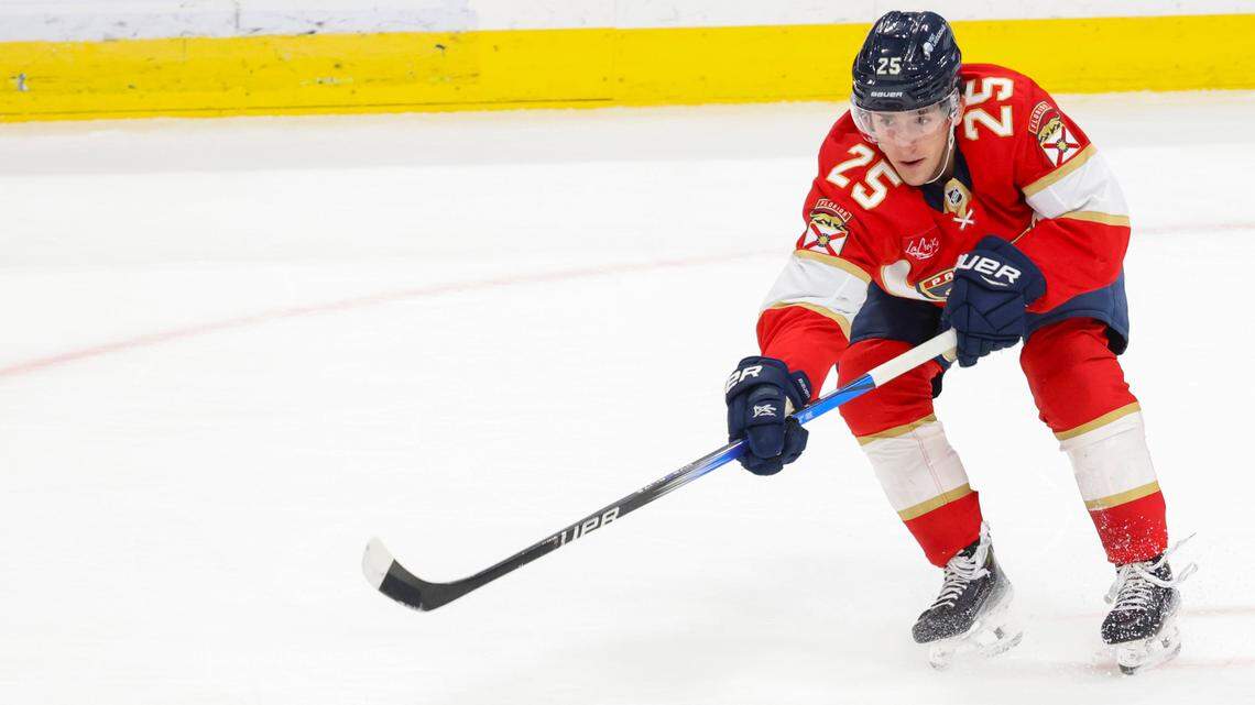 Florida Panthers right wing Mackie Samoskevich (25) passes the puck during the second period of a game against the Washington Capitals on Monday, Nov. 25, 2024, at Amerant Bank Arena in Sunrise, Fla.