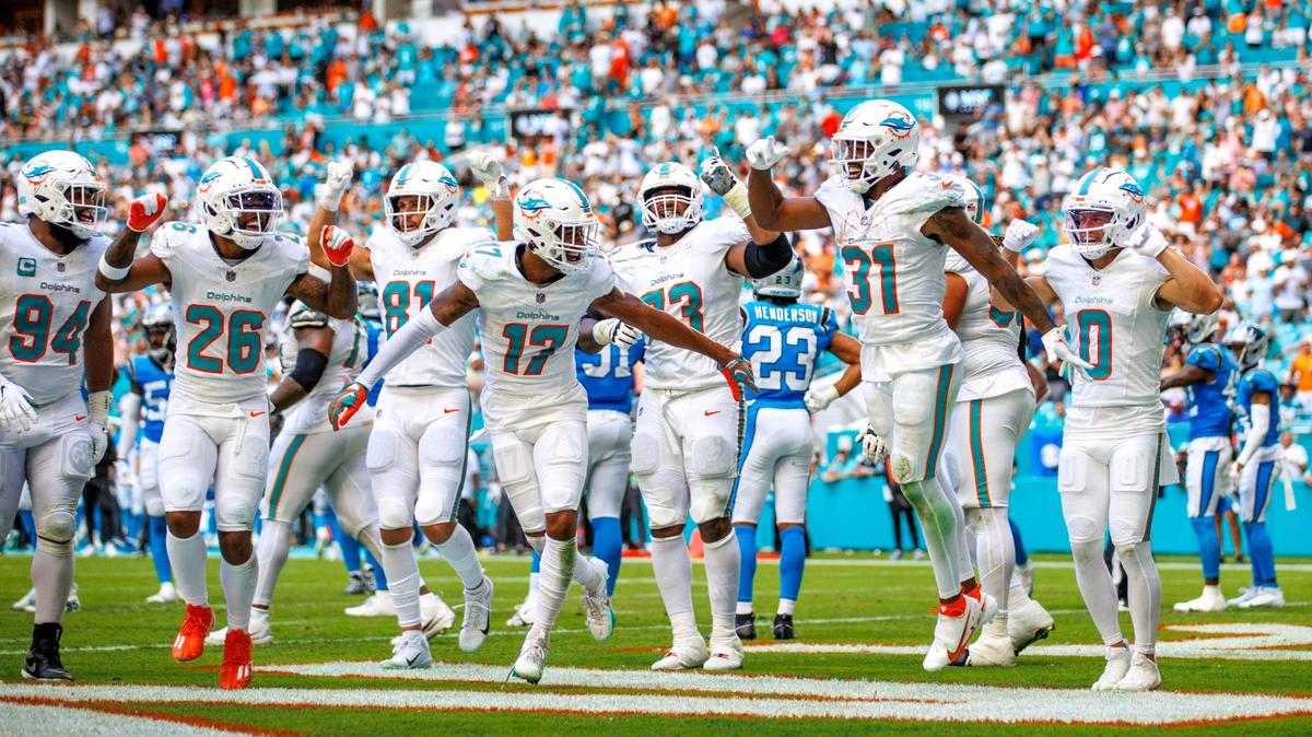 Miami Dolphins running back Raheem Mostert (31) celebrates with teammates after scoring a touchdown during third quarter of an NFL football game against the Carolina Panthers at Hard Rock Stadium on Sunday, Oct. 15, 2023 in Miami Gardens, Fl.