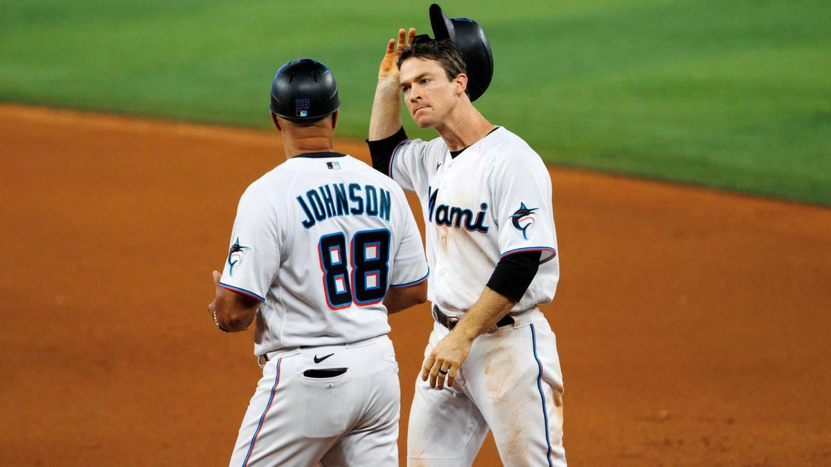 Miami Marlins second baseman Joey Wendle (18) reacts after grounds out with two men on base during the seventh inning of a baseball game against the Texas Rangers at LoanDepot Park on Thursday, July 21, 2022 in Miami, Florida.