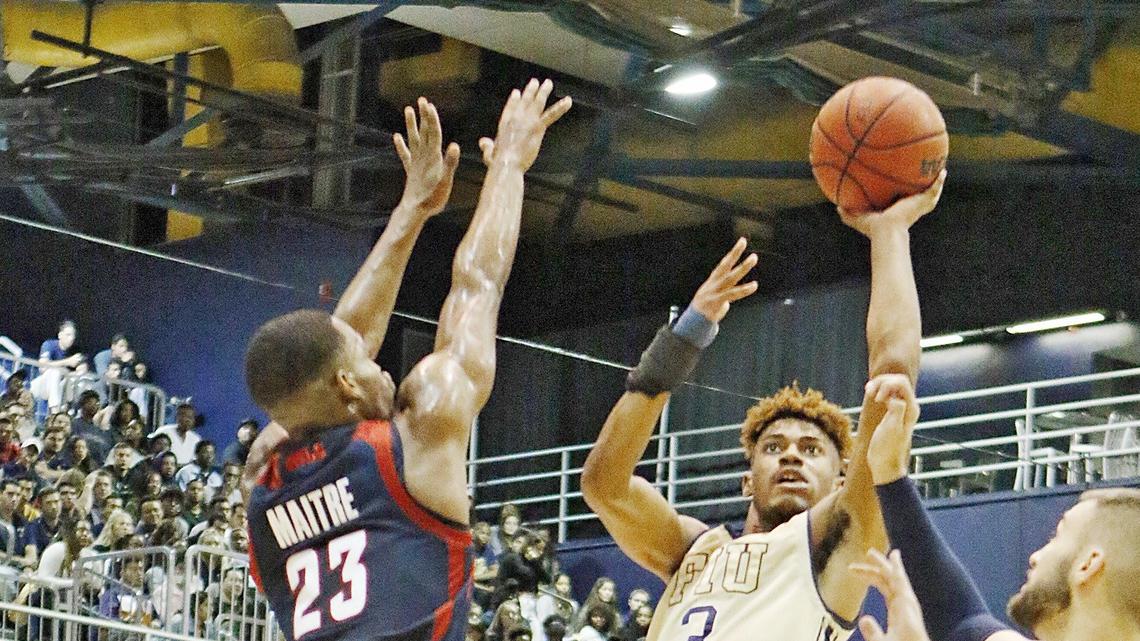FIU Panthers’ Trejon Jacob (3) shoots against FAU Owls during the men’s basketball game on Saturday, Jan. 26, 2019 at FIU Ocean Bank Convocation Center in Miami.