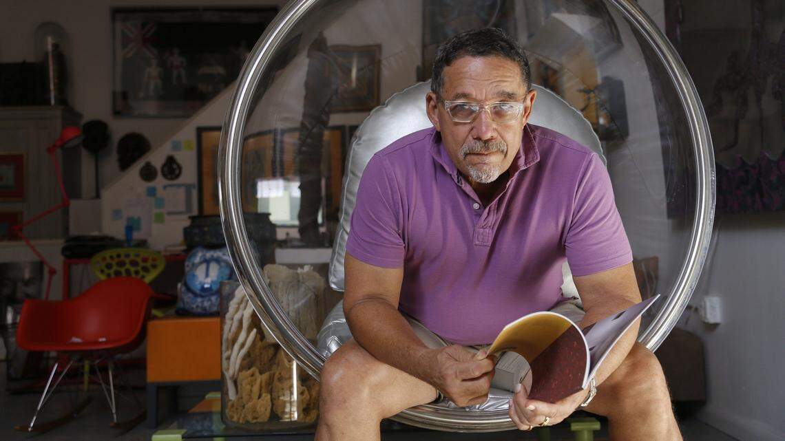 International renowned Haitian artist Edouard Duval-Carrie sits in his studio in Miami’s Little Haiti neighborhood.  For the past five years, Duval-Carrie , artistic director of the Haitian Cultural Arts Alliance, has exhibited “Global Caribbean” inside the Little Haiti Cultural Center during Basel.  The EDC Art Complex includes the non-profit Little Haiti Cultural Arts Alliance along with his studio.  Little Haiti is an oasis with artists, restaurants, and local vendors whom have set-up shops creating an authentic Haitian cultural experiences for both locals and visitors alike. 