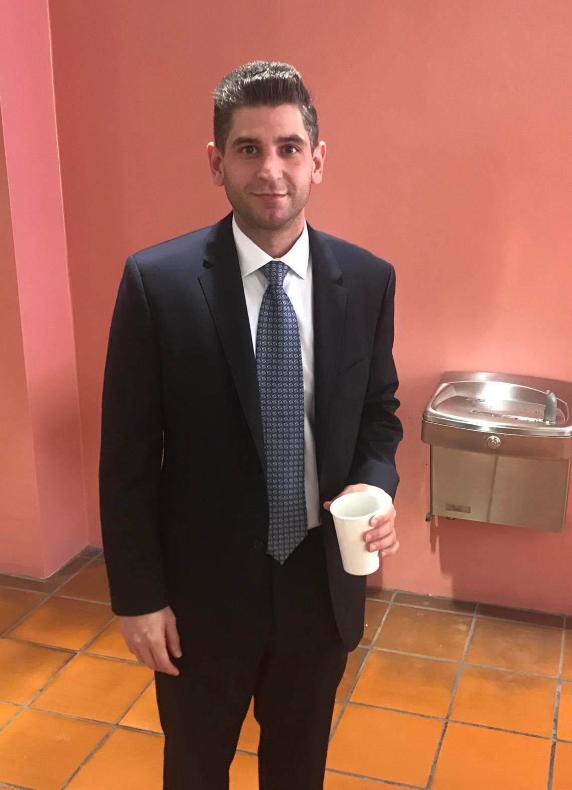 Gordon Bello, a legislative director at the Miami-Dade County Commission, is the plaintiff in a suit against Liberty University president Jerry Falwell Jr., over what Bello claims is a promised share in a South Beach hostel purchased by the Falwell family in 2013. He was photographed on Monday, Oct. 7, 2019, at a county housing summit in downtown MIami.