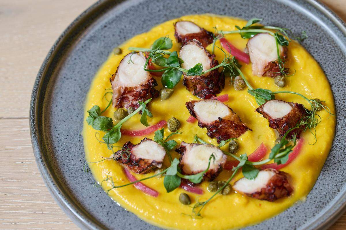Octopus Santorini with marinated onions, capers and yellow split pea puree at Zaytinya.