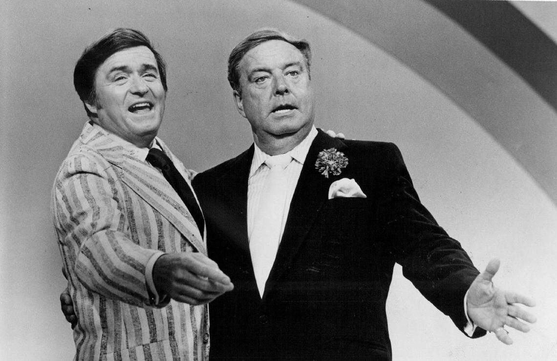 Talk show host Mike Douglas, left, welcomes The Great One, Jackie Gleason, as co-host in Miami Beach in 1972.