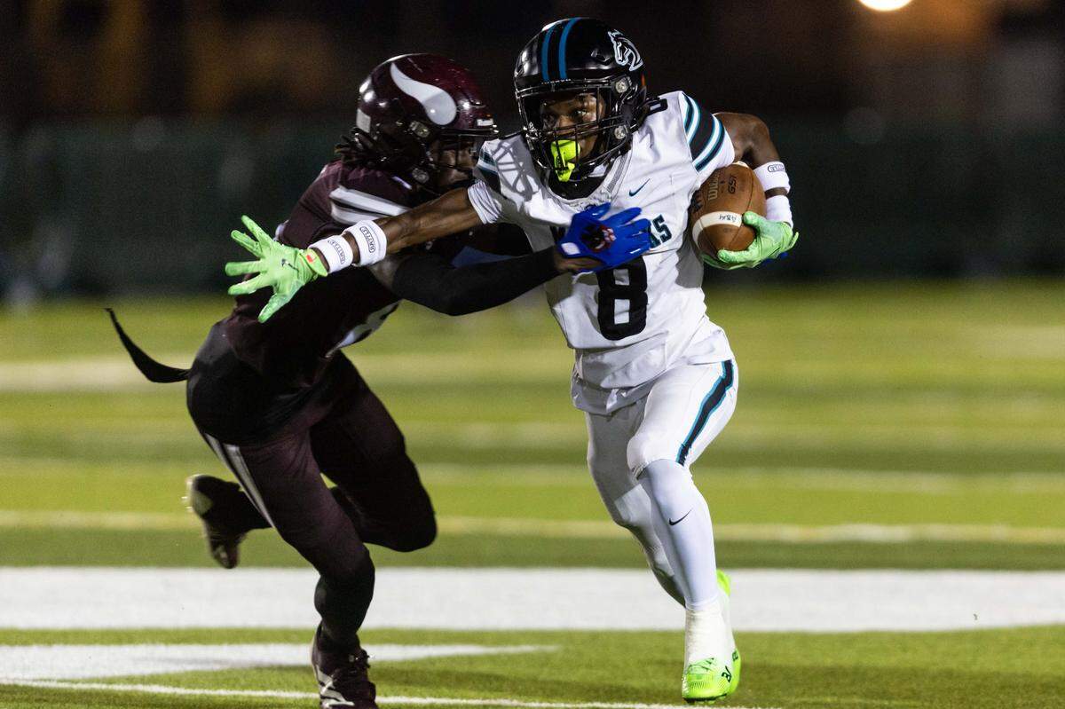 Archbishop McCarthy Mavericks running back Jeremiah Alexandre (8) is tackled by Miami Norland defensive back Alan Blackshere (8) during a high school football game at Traz Powell Stadium on Thursday, September 25, 2025, in Miami, Fla.