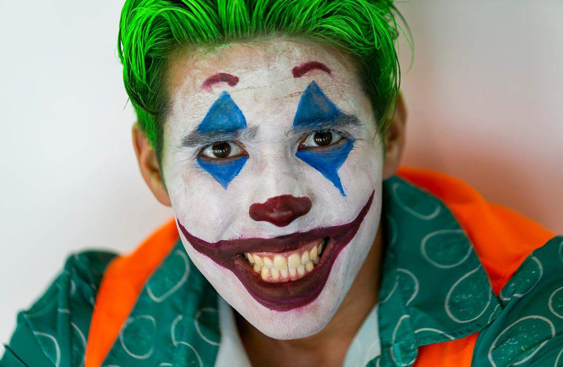 Kaden Vega cosplays as the Joker from DC’s “Batman” franchise during Florida Supercon.