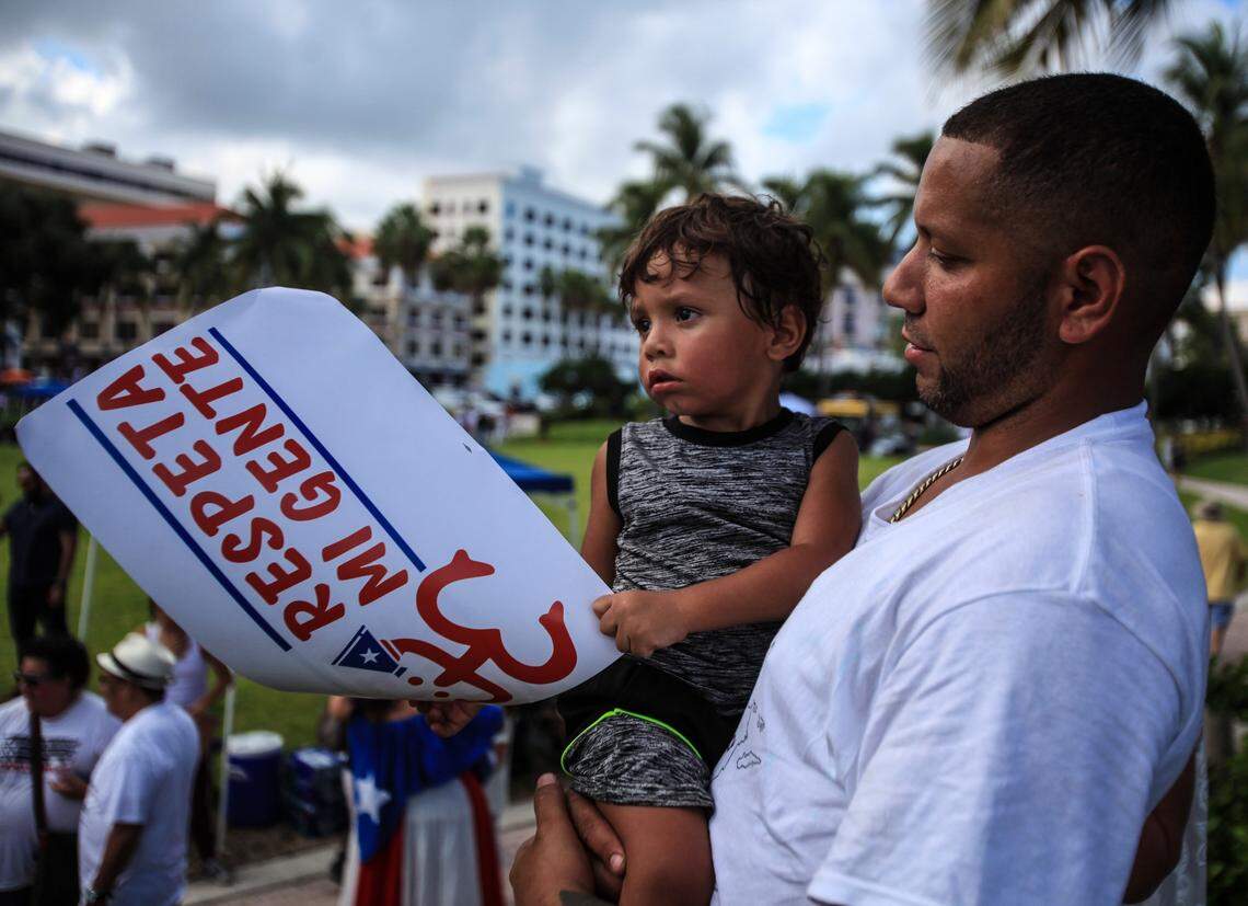 Orlando, Florida residents Miguel Rodriguez brings his son Israel Montes to the commemoration of the victims who died indirectly or directly from Hurricane Maria in Puerto Rico: “I brought him because that’s my island.”