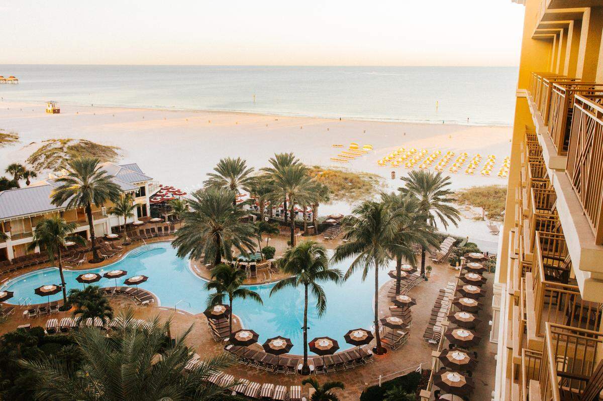 Relax by the geothermal-heated pool at Sandpearl Resort.