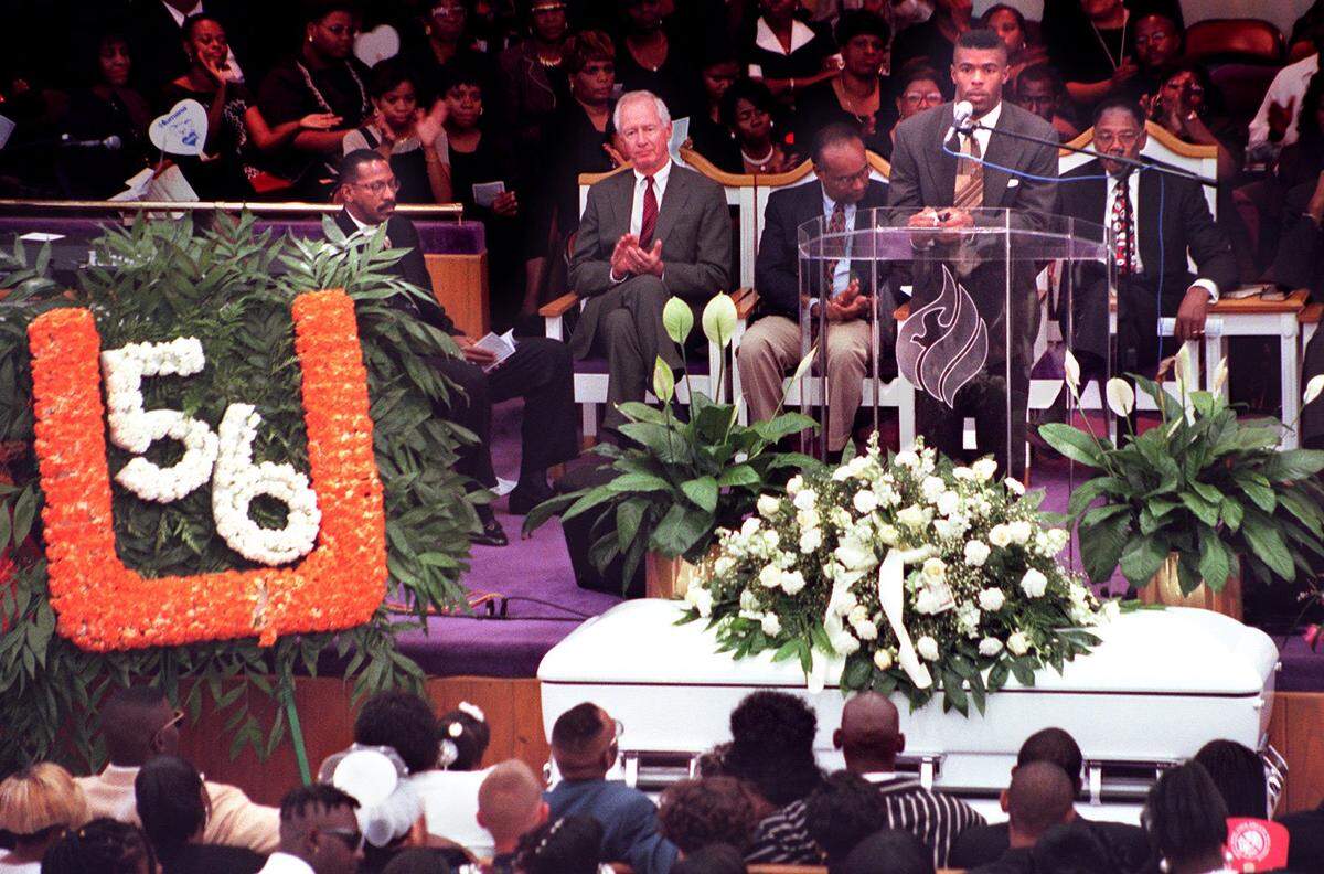 Earl Little speaks in memory of his best friend at the funeral for Marlin Barnes, who wore the number 56 on his University of Miami football jersey. An overflow crowd at New Birth Baptist Church in North Miami paid respects to Barnes.