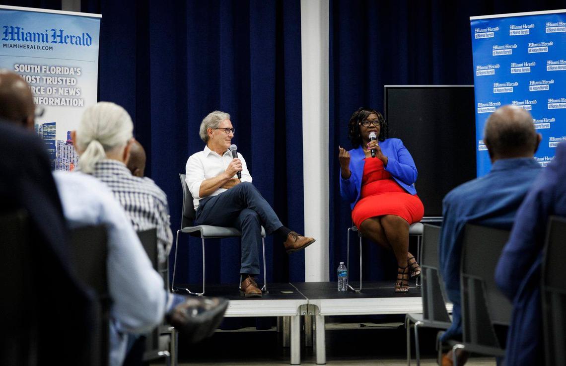 Jacqueline Charles, Haiti/Caribbean Correspondent for the Miami Herald, right, speaks to the community during an interview with Jay Weaver, Miami Herald editor, left, about Haiti’s past and future during An Evening with Jacqueline Charles on Thursday, May 30, 2024, at African Heritage Cultural Arts in Miami.