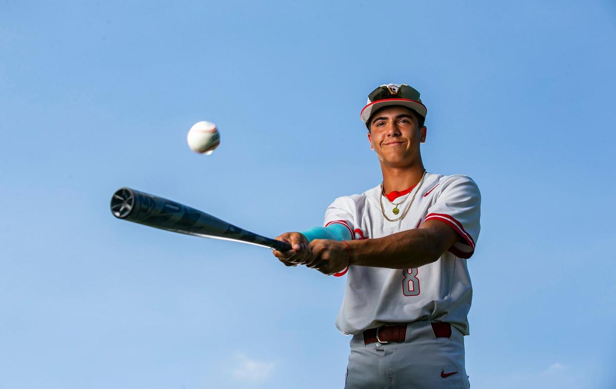 Dade Baseball Pitcher of the Year Adrian Santana, from Doral Academy Preparatory School, is photographed at A.D. Barnes Park in Miami, Florida on Wednesday, May 18, 2022.