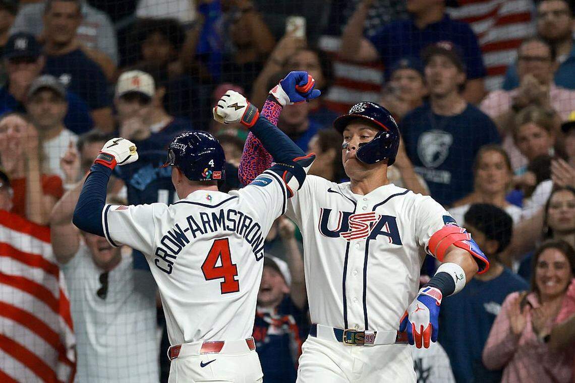 HOUSTON, TEXAS - MARCH 10: Pete Crow-Armstrong #4 and Aaron Judge #99 of the United States celebrate after a home run in the ninth inning against Italy during the 2026 World Baseball Classic at Daikin Park on March 10, 2026 in Houston, Texas. (Photo by Kenneth Richmond/Getty Images)
