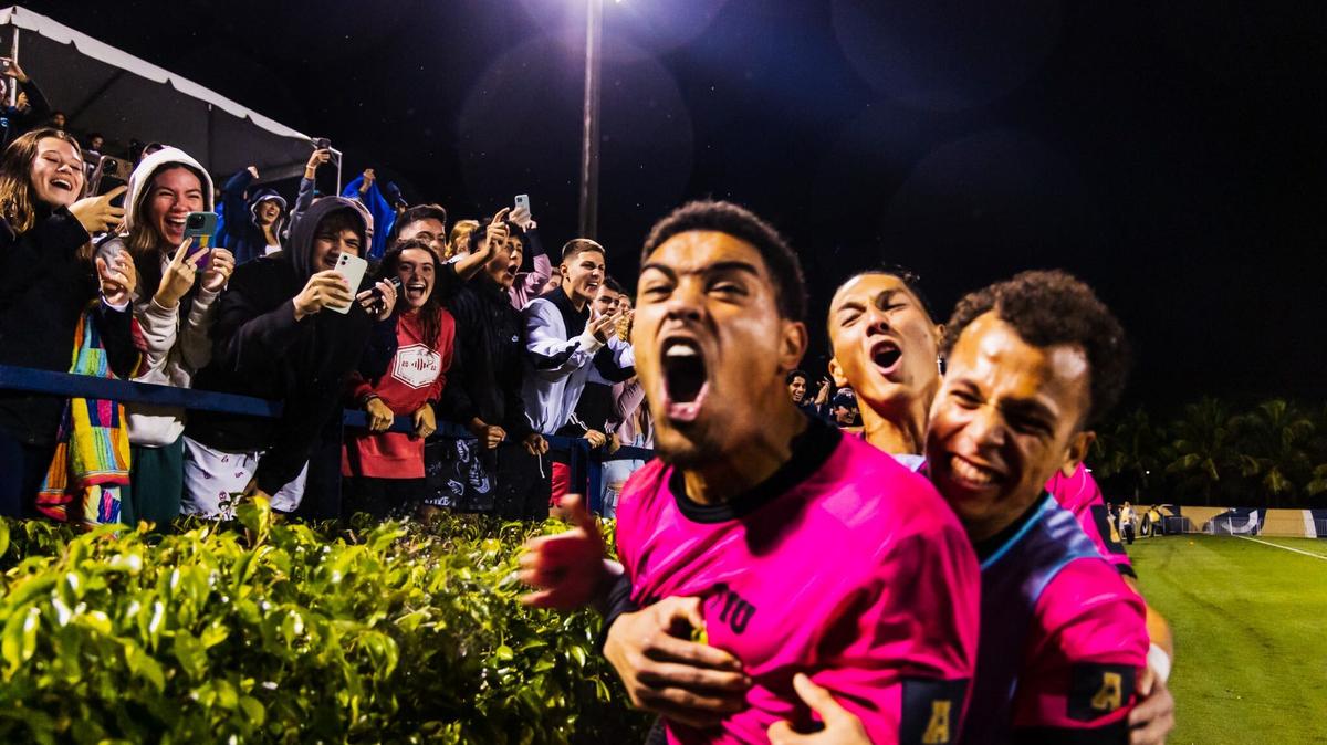 FIU players and fans celebrate after the team advanced to the Sweet 16 round by defeating visiting New Hampshire, 3-2, on penalty kicks.