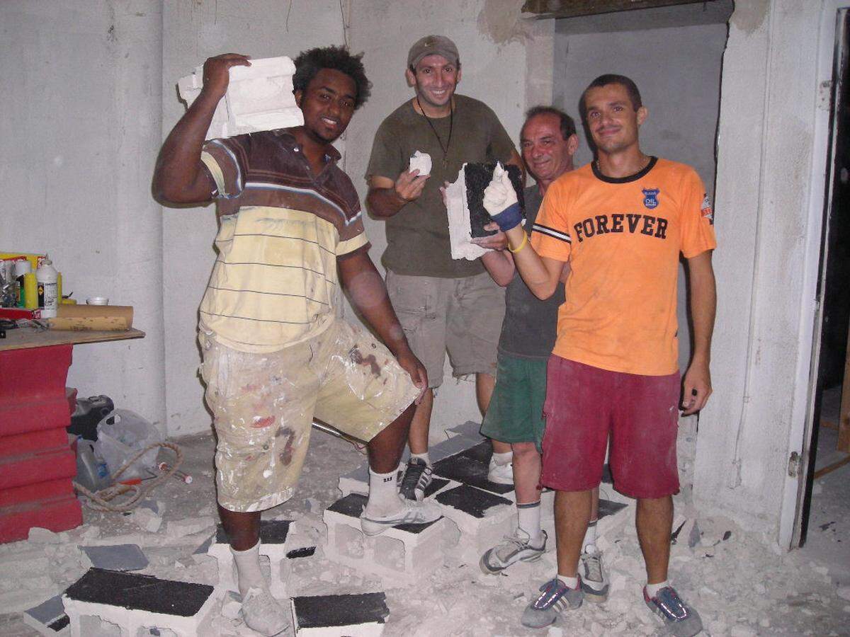 From left to right: José Varela, Laurent Scimeca, Mr. Scimena and Michael Athea during the construction of Midtown Stadium.