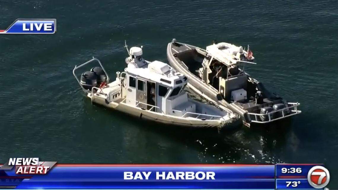 An aerial shot from a WSVN helicopter shows two marine patrol boats floating off a dock in Bay Harbor Islands Wednesday, Dec. 1, 2021. The U.S. Border Patrol investigated a suspected migrant landing in the area.
