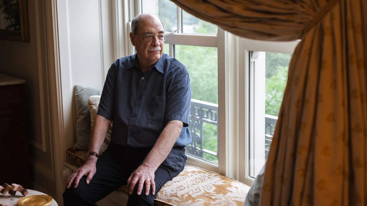 Chuck Manski, an economist at Northwestern University, sits at home in Chicago. After suffering severe side effects from a