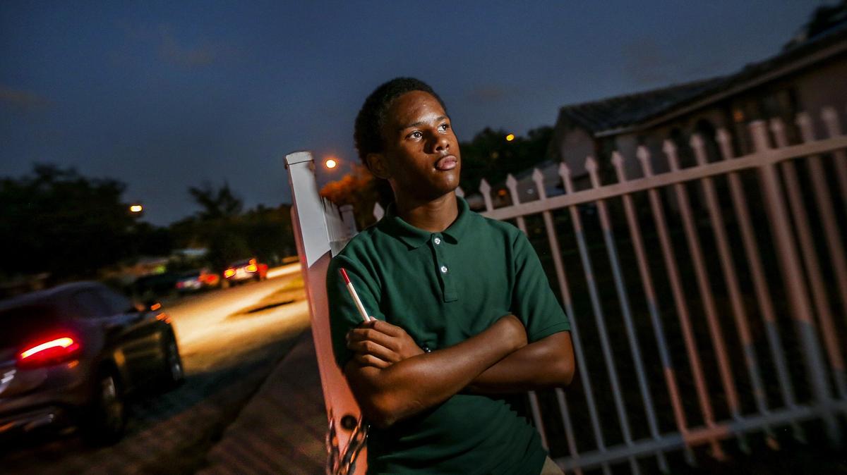 Vernard Allen outside his mother’s house. Vernard has been raised in a family in which both his father and grandmother were killed in neighborhood shootings.