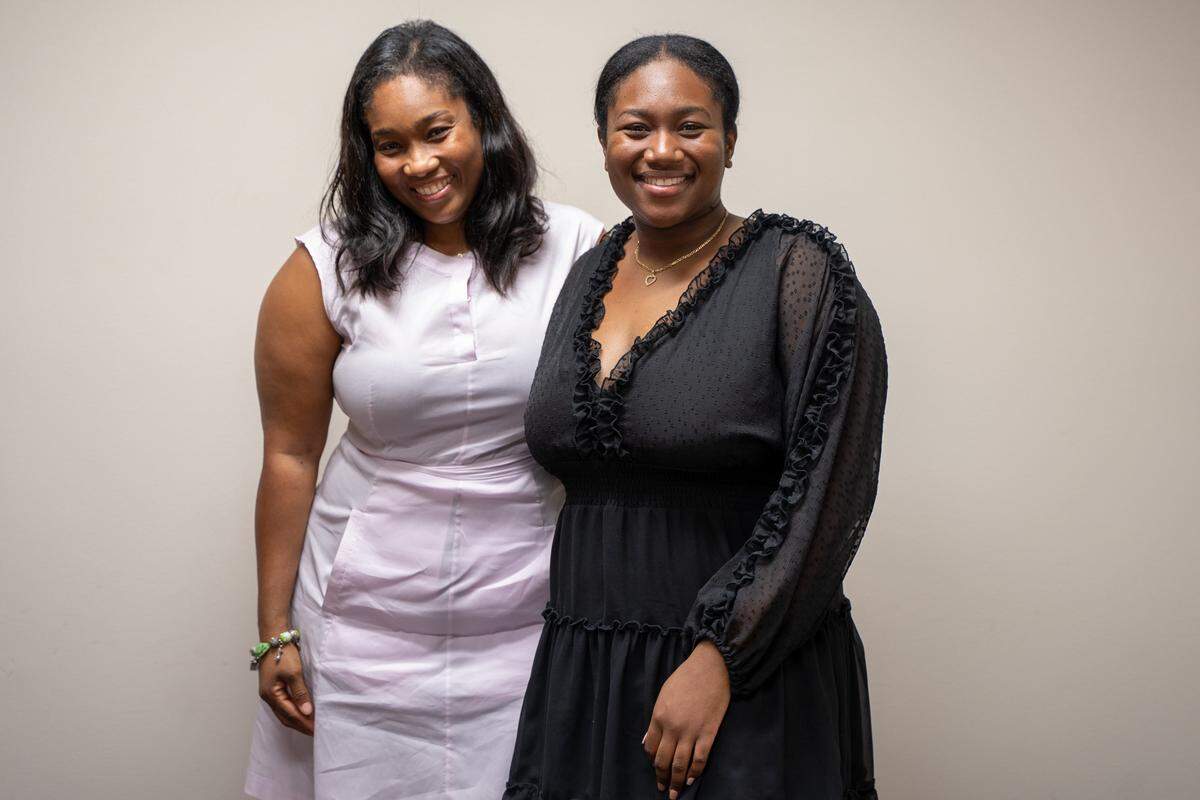 The Florida chapter of Women of AT&T recently awarded several scholarships to former Miami-Dade County high school students. Pictured is scholarship recipient Nia Symone, right, with her mother, Cristal Cole.