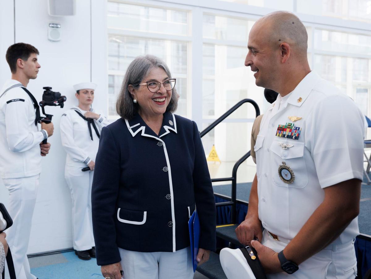 Miami-Dade County Mayor Daniella Levine Cava talks to Chief Derik Bowen, Navy Talent Acquisition Group in Miami, before the opening day of Fleet Week on Monday, May 6, 2024, at Norwegian Cruise Lines Terminal in PortMiami.