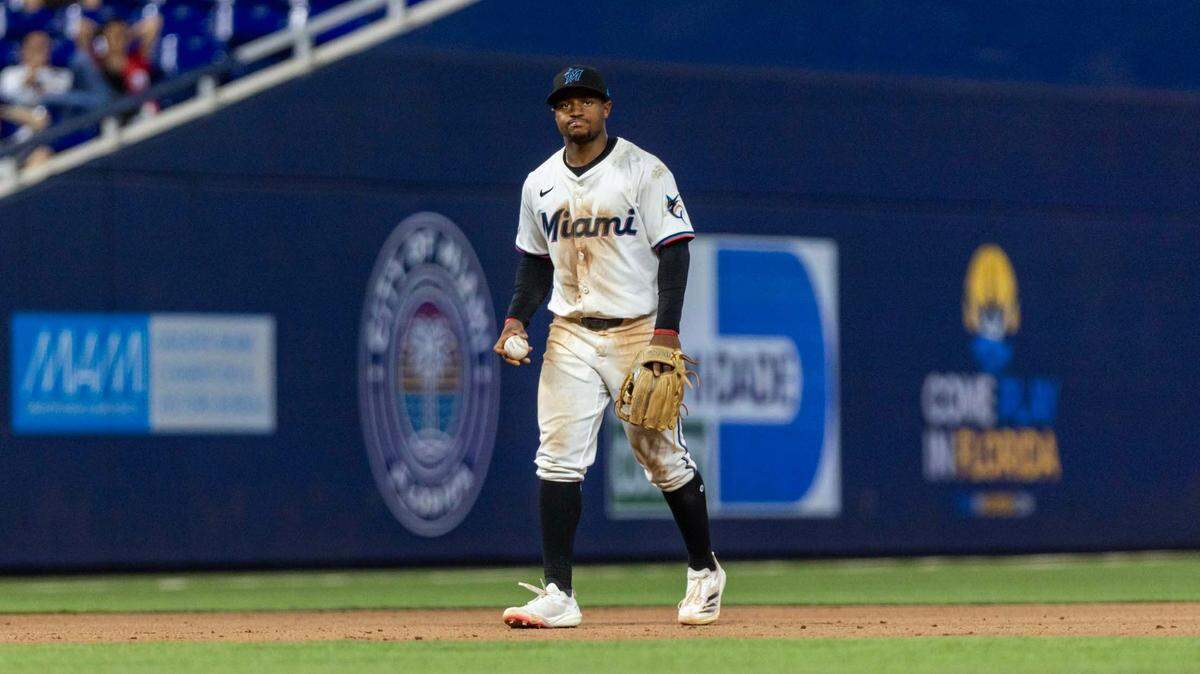 Miami Marlins shortstop Xavier Edwards (9) reacts to committing a fielding error during the eleventh inning of an MLB game against the New York Mets at loanDepot park on Wednesday, April 2, 2025, in Miami, Fla.