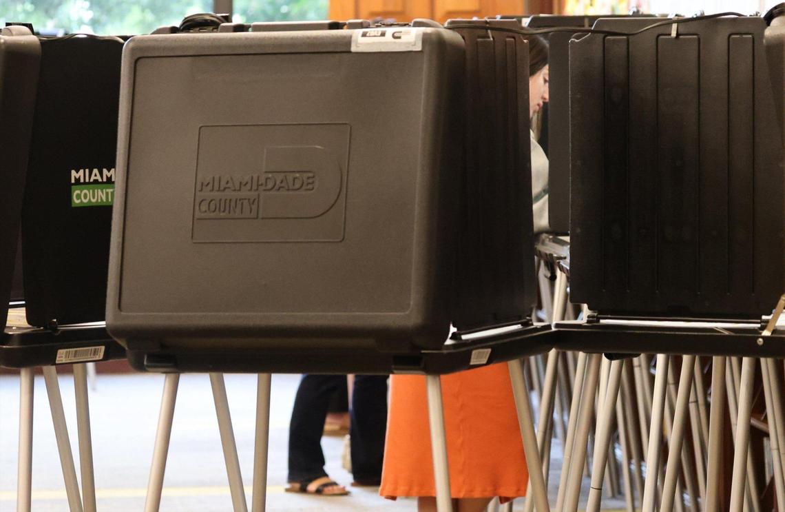 A voter cast her vote during early voting on Monday, October 21, 2024, in Coral Gables, Florida.
