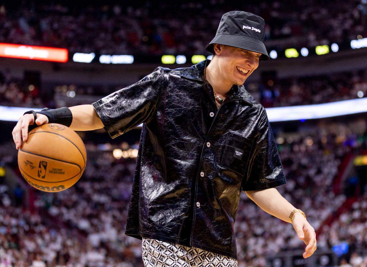 Miami Heat shooting guard Tyler Herro dribbles the ball during the first half of Game 3 of the NBA Eastern Conference Finals series against the Boston Celtics at Kaseya Center in Miami, Florida, on May 21, 2023. Herro was cleared to resume non-contact basketball work on Tuesday after breaking his right hand in the opening game of the team’s playoff run.