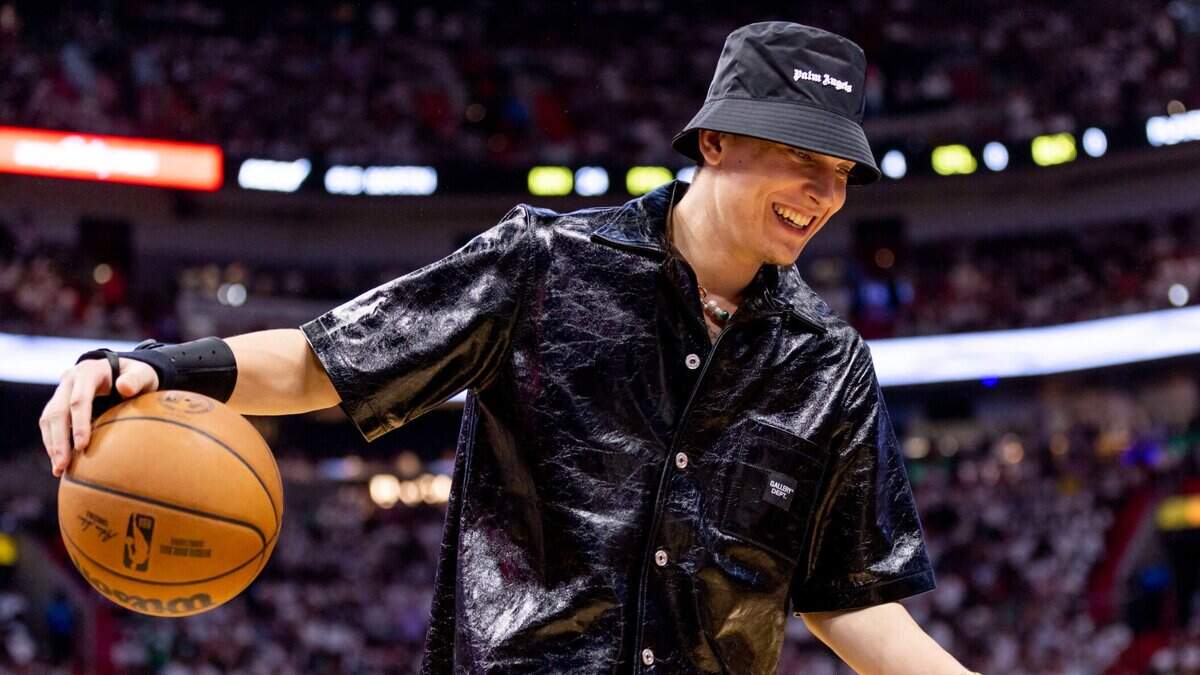 Miami Heat shooting guard Tyler Herro dribbles the ball during the first half of Game 3 of the NBA Eastern Conference Finals series against the Boston Celtics at Kaseya Center in Miami, Florida, on May 21, 2023. Herro was cleared to resume non-contact basketball work on Tuesday after breaking his right hand in the opening game of the team’s playoff run.