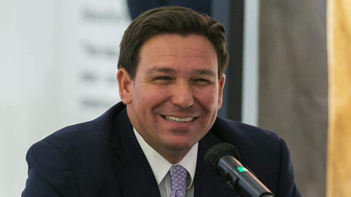 Gov. Ron DeSantis reacts during a roundtable discussion at the American Museum of the Cuban Diaspora in Miami’s Coral Way neighborhood on Feb. 7, 2022.