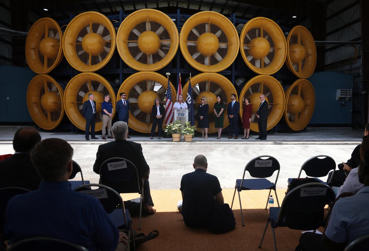 FEMA Administrator Deanne Criswell, center, announces a new federal initiative to modernize building codes across the nation to prepare for disasters and climate change. She spoke at Florida International University’s Wall of Wind on Wednesday, June 1, 2022.
