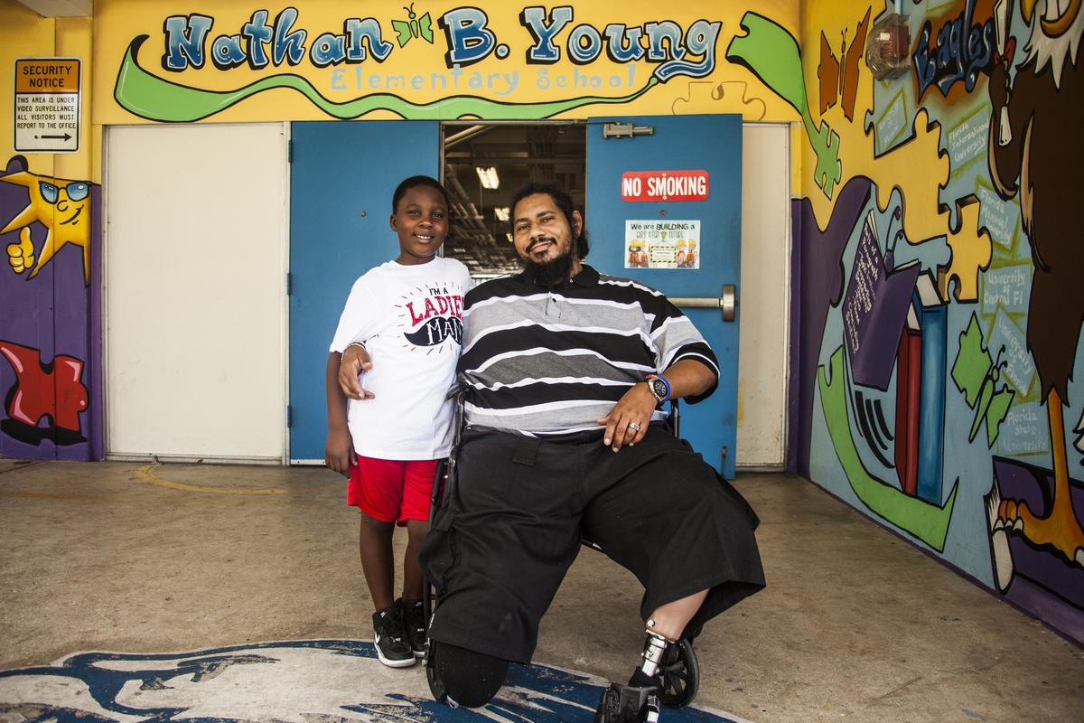 MIAMI, FL -- FRIDAY, JUNE 14, 2019-- Elias Cantrell turner was adopted by Antwayne Leland, a member of the Fatherhood Task Force of South Florida, an initiative to increase involvement in schools throughout Miami-Dade County by giving fathers and male role models more opportunities with children in their community. (Maria Alejandra Cardona / For the Miami Herald)