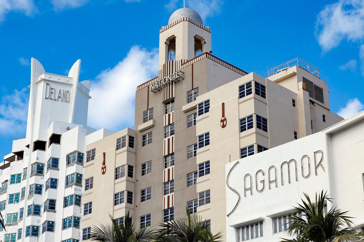 Owners of the Delano and National hotels, center and left, have objected to plans by the owners of the adjacent Sagamore and Ritz-Carlton hotels to build a 15-story luxury condo tower addition in the historic 1940s district along Collins Avenue.