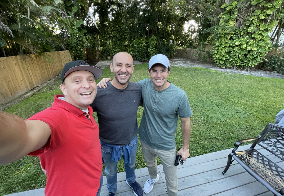 Rodolfo Saccoman, middle, poses with CryptoLeague co-founders Gleb Chuvpilo, left, and Jeff Nuckols.