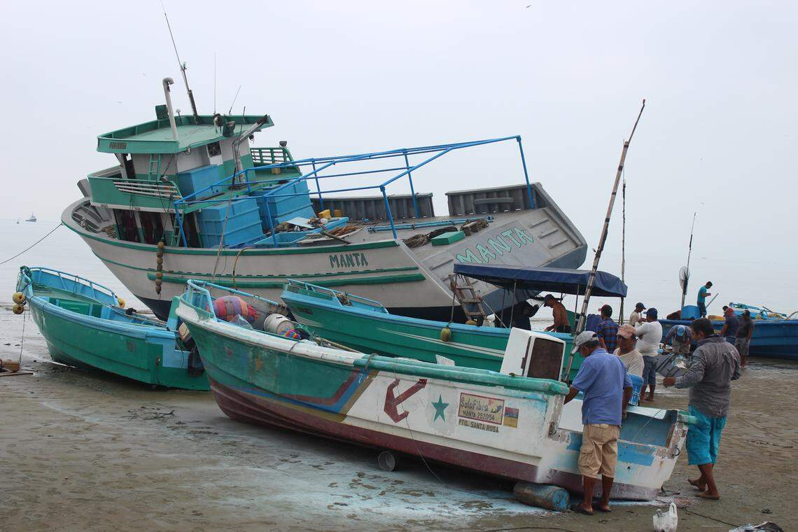A longliner, the Manta, gets maintenance on Playita Mia, a beach on the Pacific coast of Ecuador known as a hub for regional shark fishing operations.
