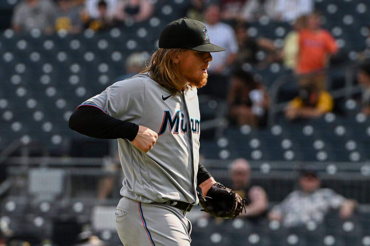Miami Marlins pitcher Jeff Brigham celebrates after defeating the Pittsburgh Pirates in the 10th inning of a baseball game, Sunday, July 24, in Pittsburgh. (AP Photo/Barry Reeger)