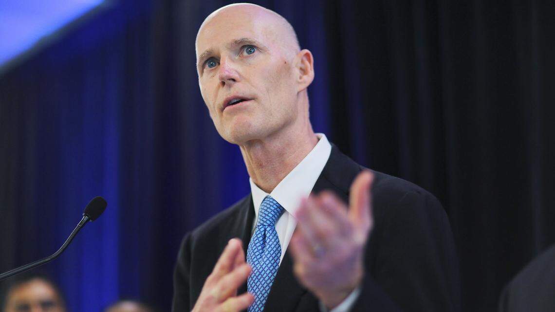 Former Florida Gov. Rick Scott speaks to the media during a visit to Advanced Pharma on February 21, 2013, in Miami. A new report estimates that Scott’s decision not to expand Medicaid likely led to thousands of preventable deaths of older, low-income adults.