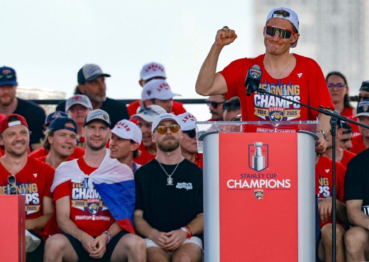 Florida Panthers left wing Matthew Tkachuk addresses the crowd as players celebrate on stage during the team’s Stanley Cup victory parade and rally along A1A in Fort Lauderdale, Florida, on Sunday, June 22, 2025
