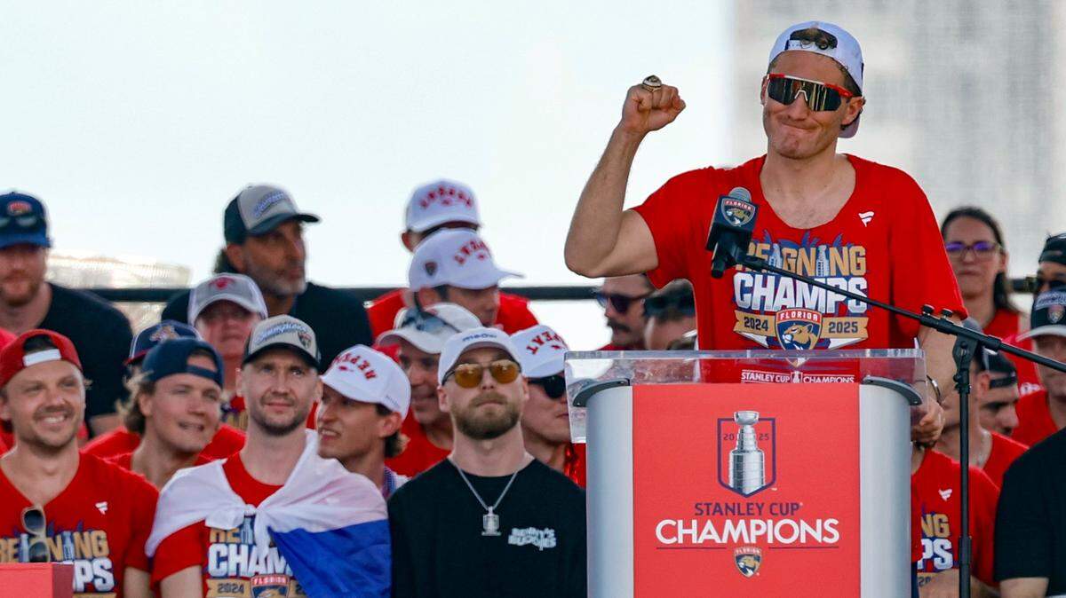 Florida Panthers left wing Matthew Tkachuk addresses the crowd as players celebrate on stage during the team’s Stanley Cup victory parade and rally along A1A in Fort Lauderdale, Florida, on Sunday, June 22, 2025