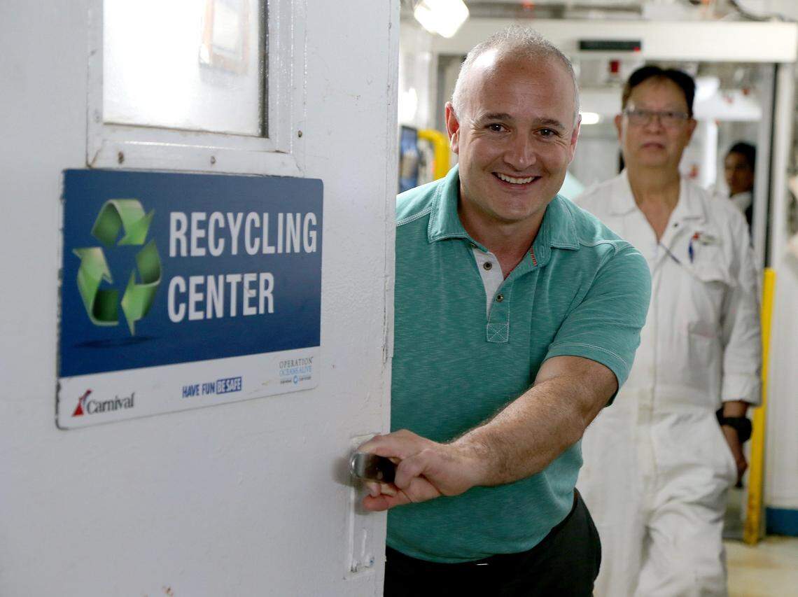 Chris Donald, senior vice president of corporate environmental compliance, posed by the entrance of the recycling center of the Carnival Victory ship where his team is testing a bio-digester, a machine designed to prevent plastic from going overboard, on Friday, October 11, 2019.