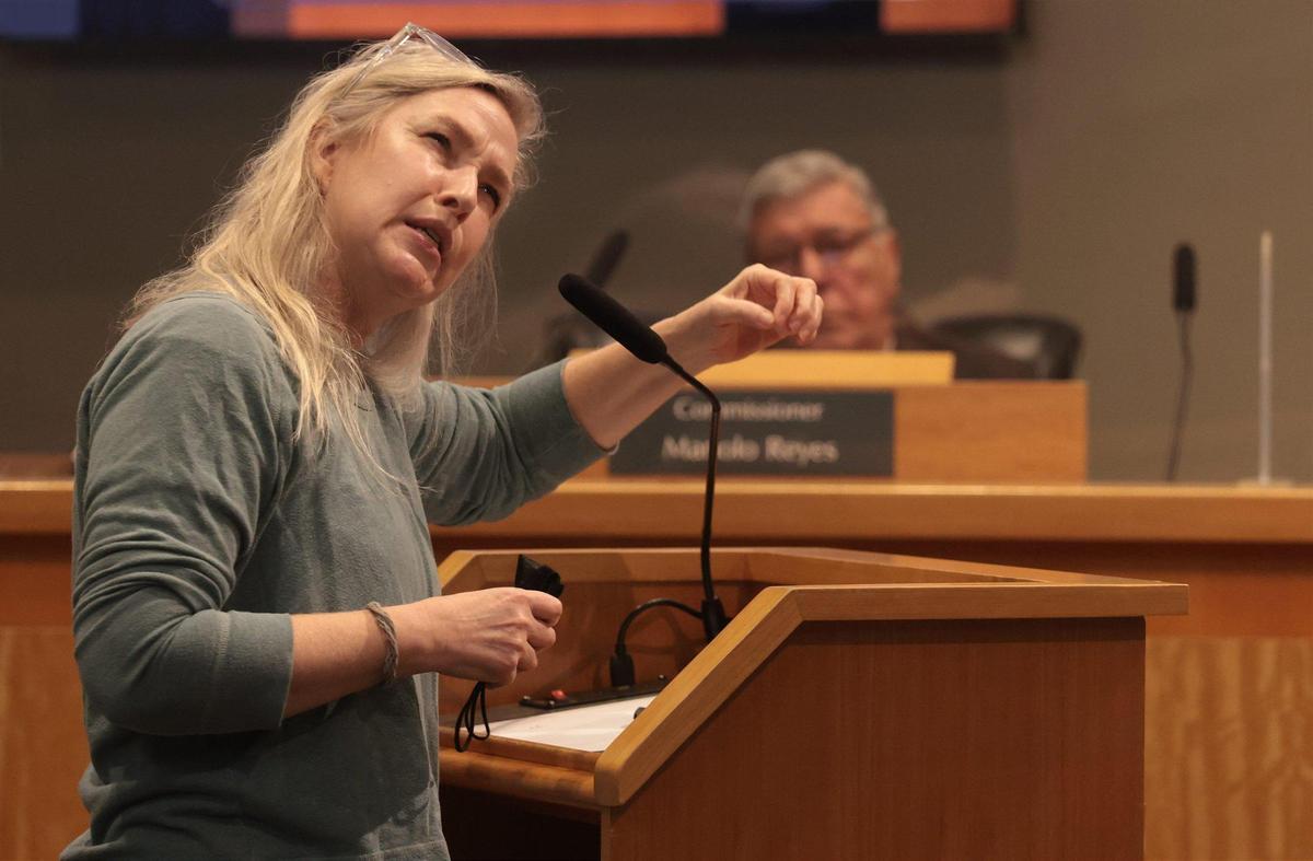 Katrina Morris gives her remarks regarding redistricting of District 2. Holland & Knight attorney and lobbyist Miguel De Grandy presented the preliminary redistricting plan in hope of balancing the population of each district during a special commission meeting at City Hall on Monday, February 7, 2022.