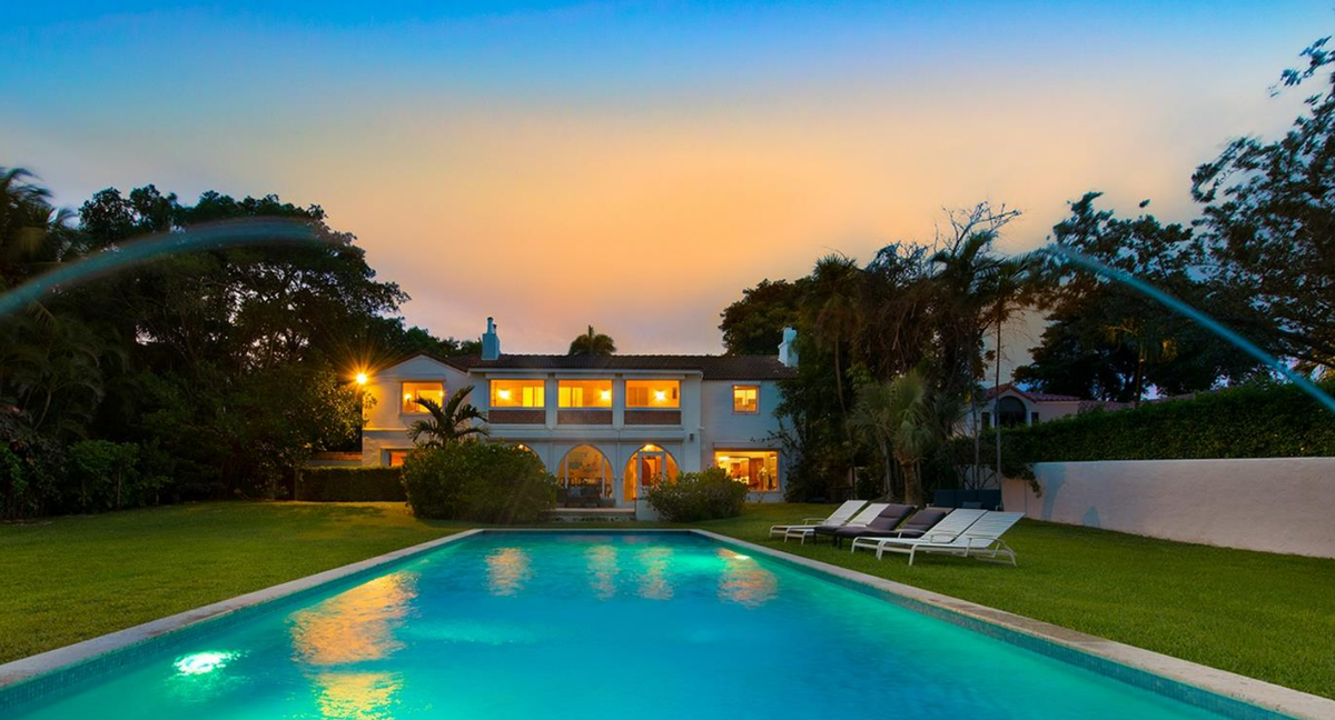 Built in 1930, the waterfront house has a library, pool and dock.