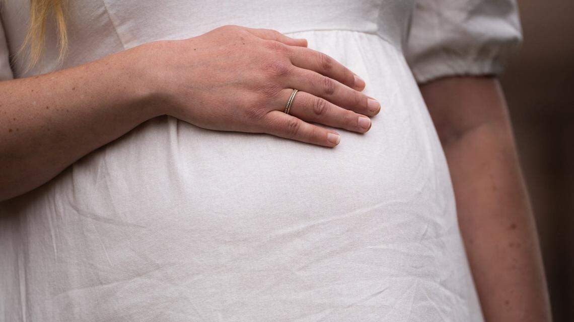 Lauren Miller, a plaintiff in the Zurawski v. State of Texas, waits to speak in front of the Texas State Capitol in Austin, March 7, 2023.