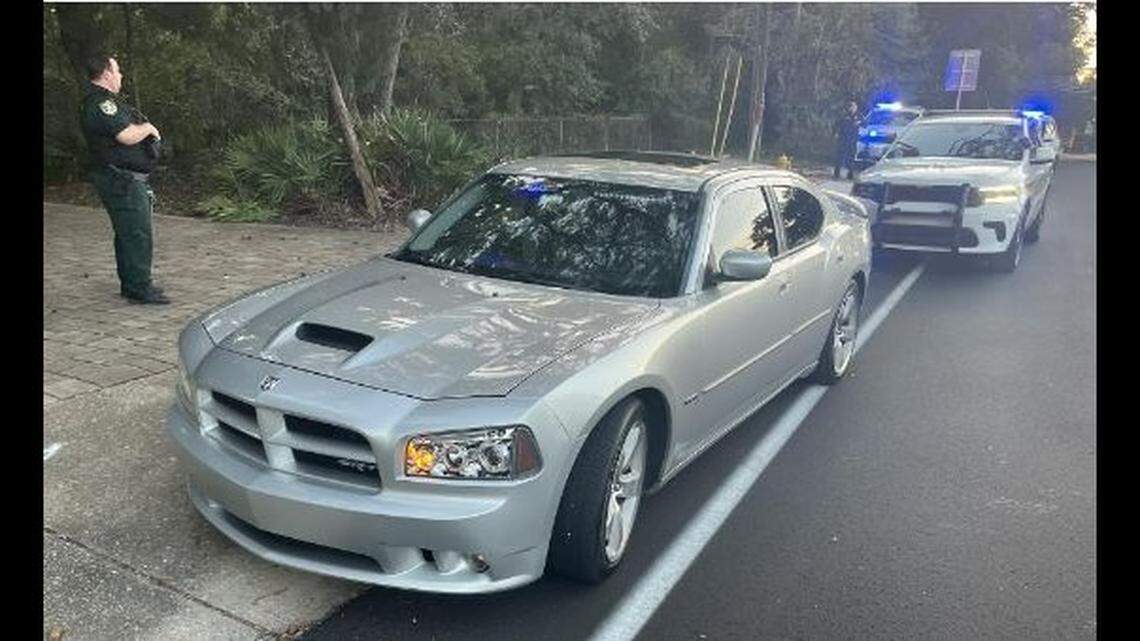 The suspect was driving a Dodge Charger with flashing blue lights in the front windshield and more lights in the back window, Okaloosa County officials say.