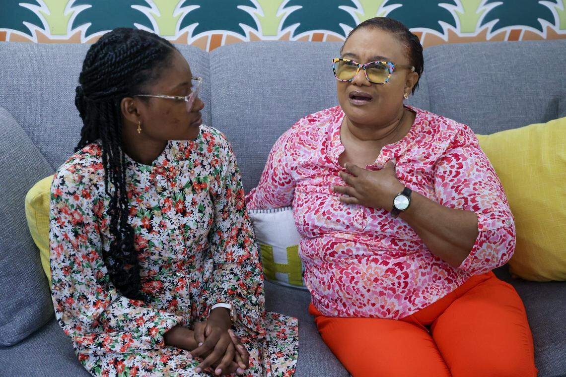 Thekle Charles, right, describes the challenges she faced after her daughter, Janelle Charles, left, was diagnosed with cancer, at the Ronald McDonald House on Wednesday, Feb. 18, 2026, in Miami.