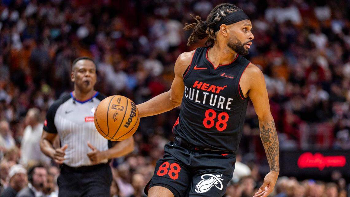 Miami Heat guard Patty Mills (88) dribbles the ball during the first half of an NBA game at Kaseya Center in Miami on March 13, 2024.
