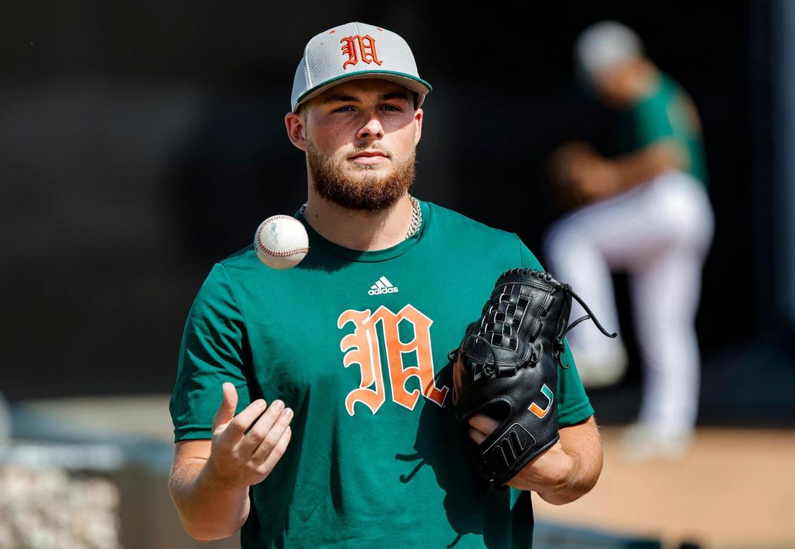 Miami Hurricanes pitcher Gage Ziehl (31) tosses the ball during practice at Miami Hurricanes Media Day at Alex Rodriguez Park at Mark Light Field in Coral Gables, Florida on Tuesday, February 13, 2024.