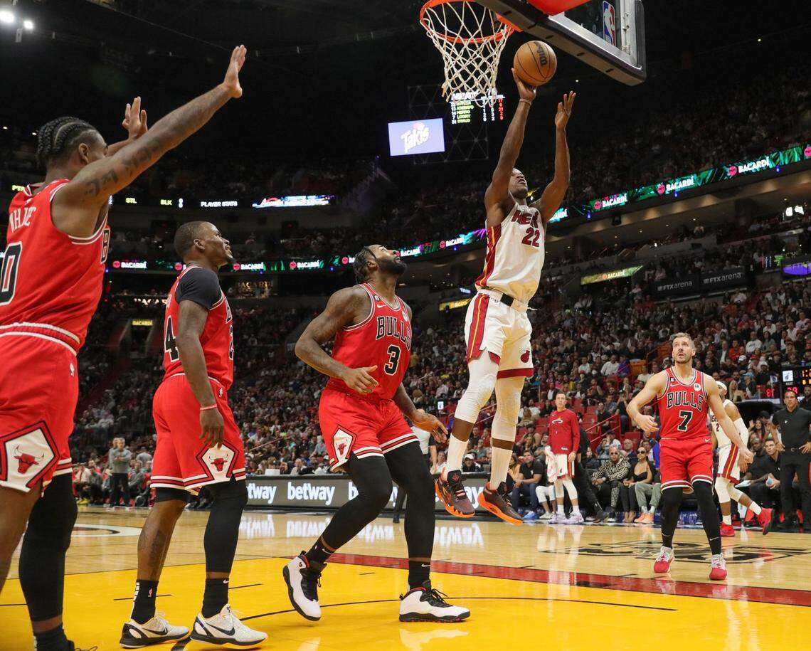 Miami Heat forward Jimmy Butler (22) dunks the ball in the second half against the Chicago Bulls at FTX Arena on Wednesday, October 19, 2022.