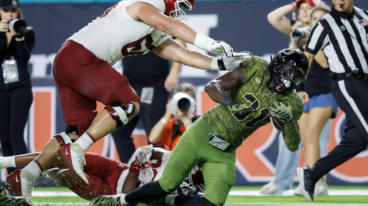 Miami Hurricanes linebacker Wesley Bissainthe (31)returns an interception against Stanford Cardinal in the second half during their NCAA football game at Hard Rock Stadium in Miami Gardens, Florida, on Saturday, October 25, 2025.