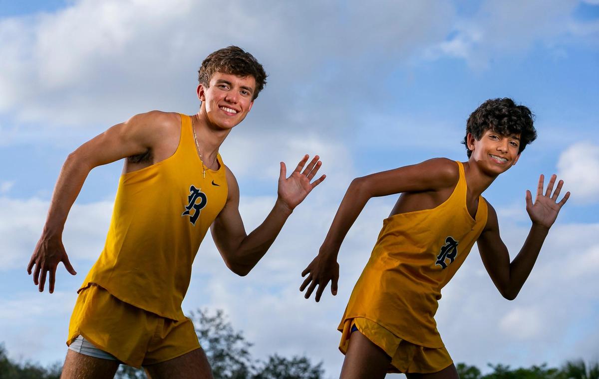 Dade Cross Country Players of the Year Adam Magoulas, left, and Joshua Ruiz, both from Belen Jesuit Preparatory School, are photographed at A.D. Barnes Park in Miami, Florida on Wednesday, January 12, 2022.