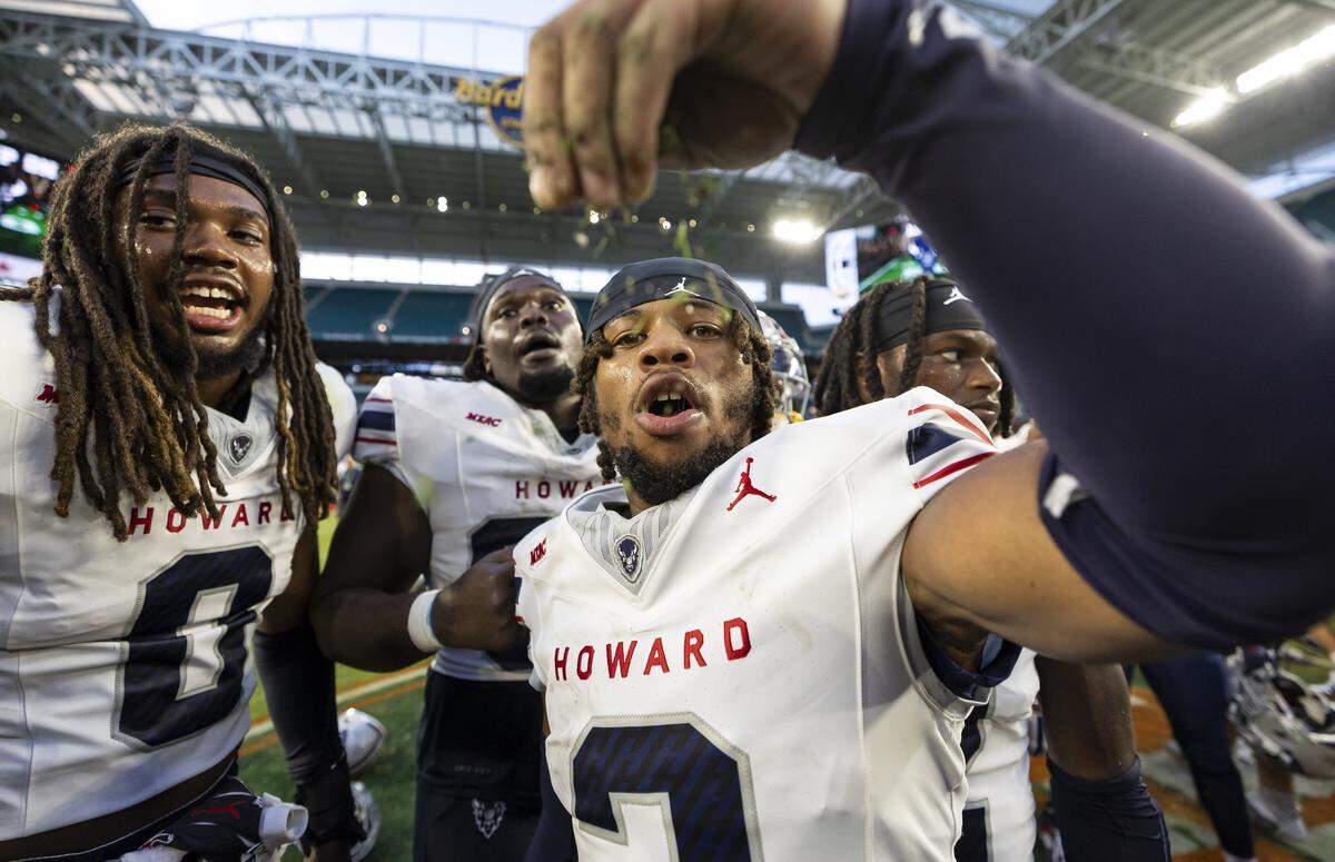 Howard Bison players celebrate after defeating Florida A&M Rattlers in their Orange Blossom Classic football game at Hard Rock Stadium on Saturday, Aug. 30, 2025, in Miami Gardens, Fla.